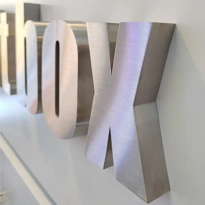 Custom Brushed Stainless Steel 3D Letters for Office Logo Walls, Retail Stores and Commercial Interiors